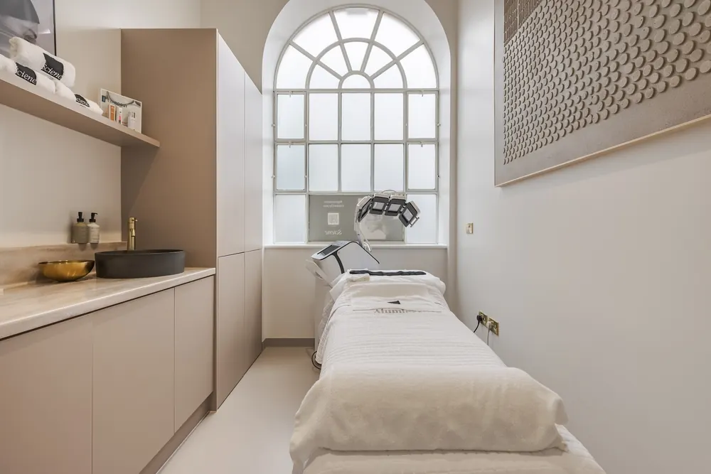 A treatment room with arched window